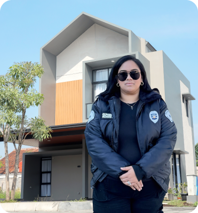 Security guard standing in front of residential houses